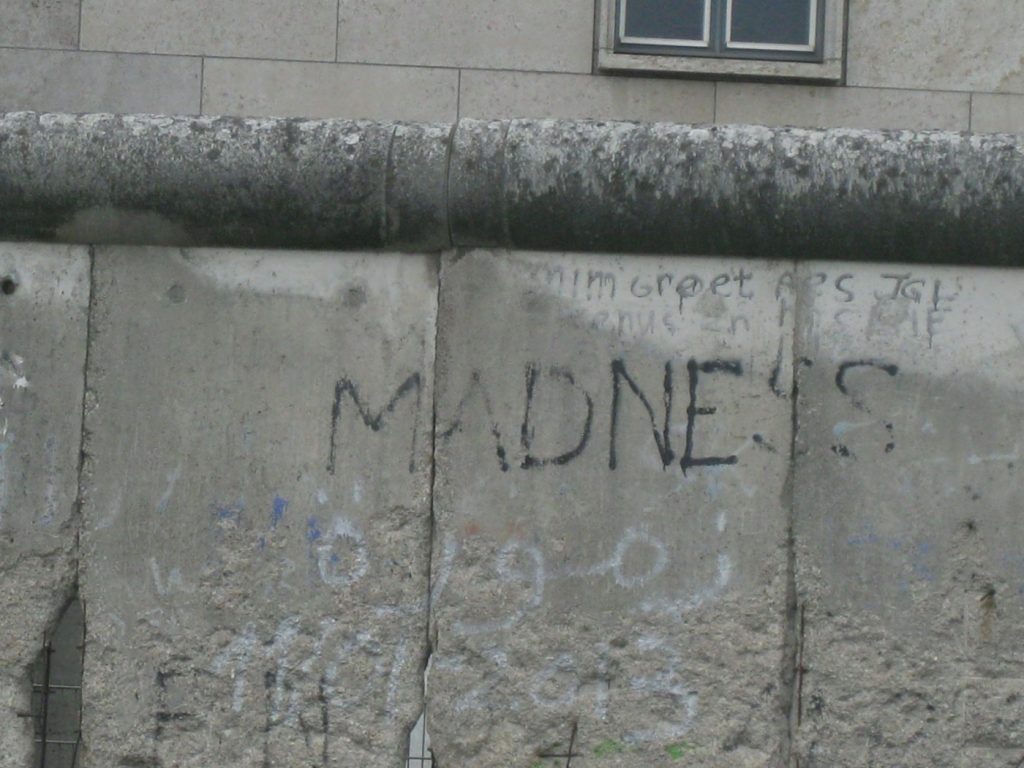 a wall with graffiti